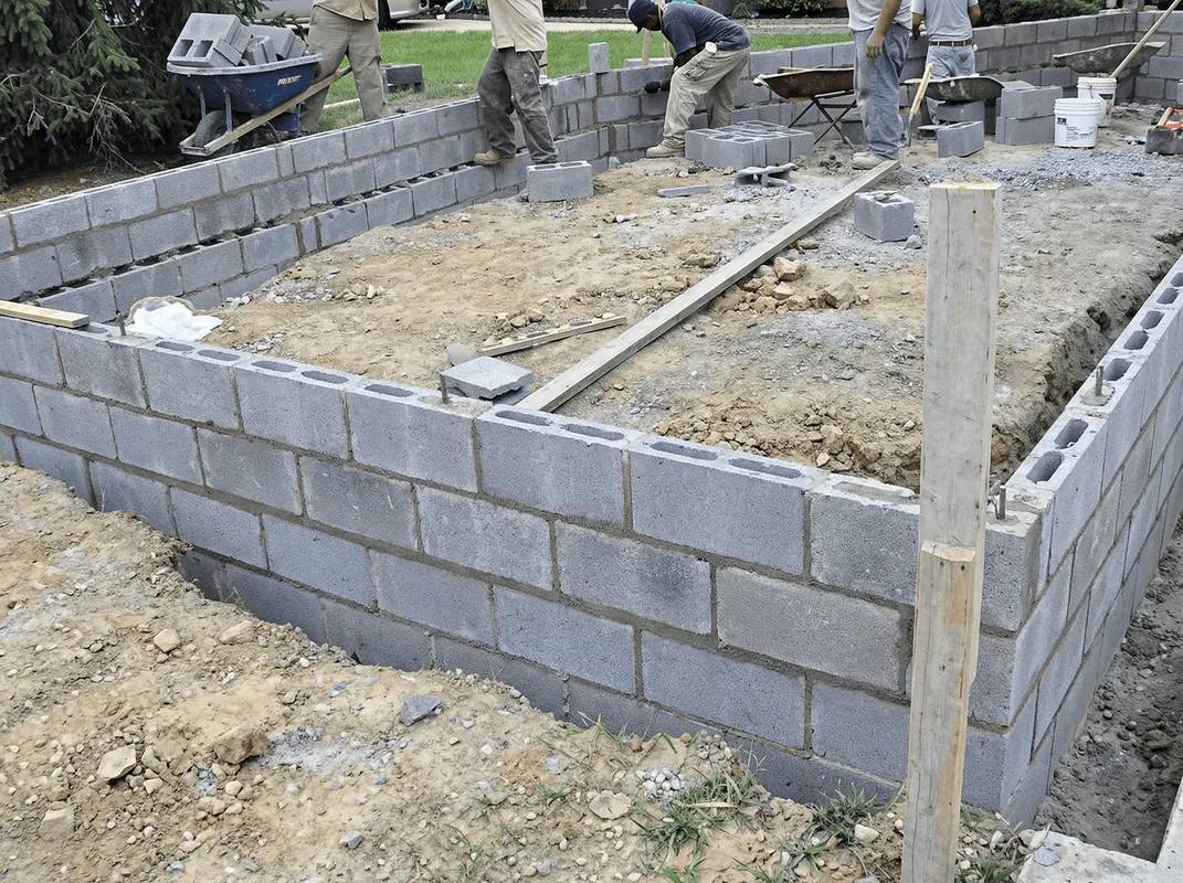 Professionals building a foundation with blocks in Boise, ID